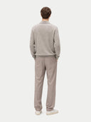 Men's Grey Cashmere Polo Sweater worn by model, back view on white background