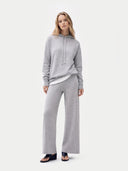 Women's Cashmere Pullover Hoodie High Rise worn by model, front view on white background