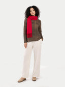 Cashmere Fringed Scarf Barberry worn by model, detail view on white background