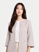 Women's Patch Pocket Cashmere Poncho Jacket Dawn Blue worn by model detail view on white background