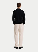 Men's Black Cashmere Polo Sweater worn by model, back view on white background