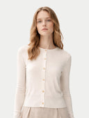 Women's Cashmere Silk Buttoned Cardigan Whisper White worn by model, detail view on white background