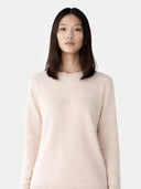 Women's Ivory White Cashmere Crewneck Sweater worn by model, detail view on white background 