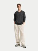 Men's Charcoal Cashmere V-Neck Sweater worn by model front view on white background  