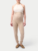Over Bump Maternity Cashmere Knit Pants Beige worn by model, front view on white background