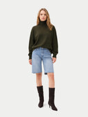 Women's T-Neck Organic Colour Cashmere Sweater Avocado worn by model, front view on white background