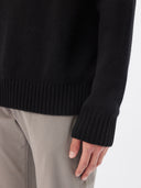Men's Cashmere Turtleneck Black worn by model, detail view on white background