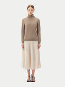 Women's Taupe Cashmere Basic Turtle Neck Sweater worn by model, front view on white background