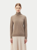 Women's Taupe Cashmere Basic Turtle Neck Sweater worn by model, detail view on white background