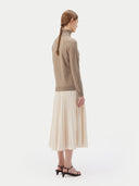Women's Taupe Cashmere Basic Turtle Neck Sweater worn by model, back view on white background