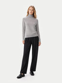 Women's Classic Cashmere Turtleneck Sweater High Rise worn by model, front view, on white background