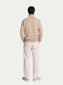 Men's Beige Turtleneck Cashmere Sweater worn by model, back view on white background