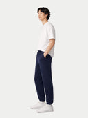 Men's Cashmere India ink Sweatpants worn by model, side view on white background