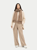 Cashmere Fringed Scarf Taupe  worn by model, front view on white background
