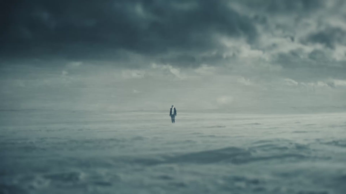 Short film: a herder crosses the snowy Mongolian steppe, a white cashmere goat stands on a rocky peak, and raw cashmere is handed over outside the GOBI factory