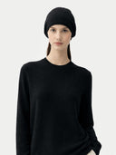 € 99 Cashmere Hat & Sweater Set Black worn by model, detail view on white background
