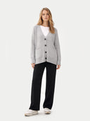 Women's Relaxed-Fit Cashmere Cardigan High Rise worn by model, front view on white background
