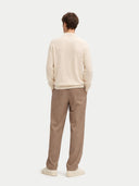 Men's White Cashmere Polo Sweater worn by model, back view on white background