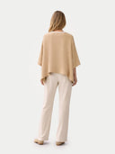 Women's Beige Cashmere  Knitted Poncho worn by model, back view, on white background