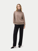 Women's T-Neck Organic Colour Cashmere Sweater Taupe worn by model, front view on white background