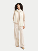 Lightweight Cashmere Woven Scarf Off White worn by model, detail view on white background