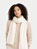 Lightweight Cashmere Woven Scarf Off White worn by model, detail view on white background #color_off-white
