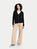 Women's Black Cashmere  V-Neck  Cardigan  worn by model, front view on white background