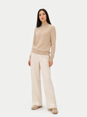 Women's Warm Grey Cashmere Mock Neck Sweater worn by model, front view on white background