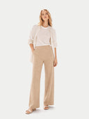 Women's Beige  Wide-Leg Ajour Knit Cashmere Pants worn by model front view on white background