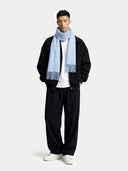 Cashmere Fringed Scarf Light Blue worn by model, front view on white background