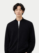 Men's Black Full-Zip Cashmere Cardigan worn by model, detail view on white background
