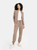 Women's Cashmere Cuffed Jogger Taupe   worn by model, front view on white background