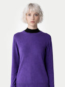 Women's Grape Jam Cashmere Crewneck Sweater worn by model, detail view on white background