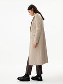 Women's Cashmere Peak Lapel Long Coat Taupe worn by model side view on white background