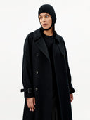 Unisex Cashmere Knitted Aviator Cap Black worn by model, front view on white background