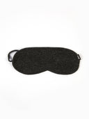 Set of black blanket, eye mask, and socks on a white background #color_charcoal