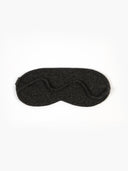 Set of black blanket, eye mask, and socks on a white background #color_charcoal