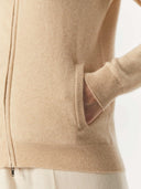 Women's Beige Cashmere Full-Zip Cardigan worn by model, detail view on white background