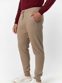 Men's Cashmere Jogger Taupe worn by model, side view on white background