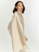 Women's Cashmere Woven Scarf Beige worn by model, detail view on white background