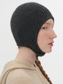 Unisex Cashmere Knitted Aviator Cap Charcoal  worn by model, side view on white background