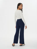 Navy blue ribbed knit scarf on a white background #color_navy