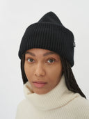 Unisex Cashmere Ribbed Chunky Beanie Black worn by model, detail view on white background