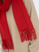 Unisex Cashmere Fringed Scarf Red worn by model, detail view on white background
