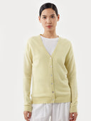 Women's  Tender Yellow Cashmere V-Neck Sweater worn by model, detail view on white background  