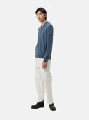 Blue zip-up cashmere bomber on a light gray background #color_china-blue