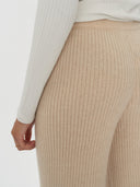 Women's Cashmere Pants Beige worn by model, detail view on white background