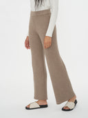 Women's Cashmere Pants Taupe worn by model, side view on white background