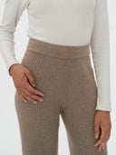 Women's Cashmere Pants Taupe worn by model, detail view on white background